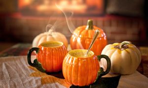 pumpkin spice lattes in pumpkin mugs